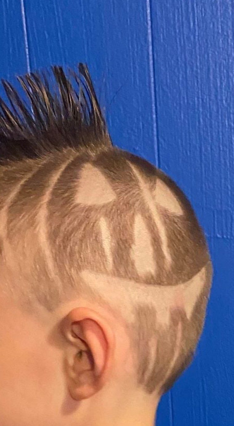 Kids' cut with a shaved-in design