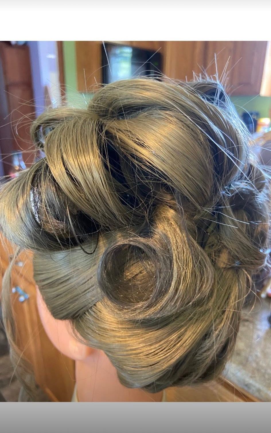 Swept updo with curls
