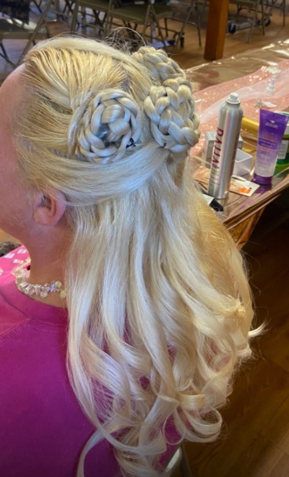 Formal updo with braided rosettes