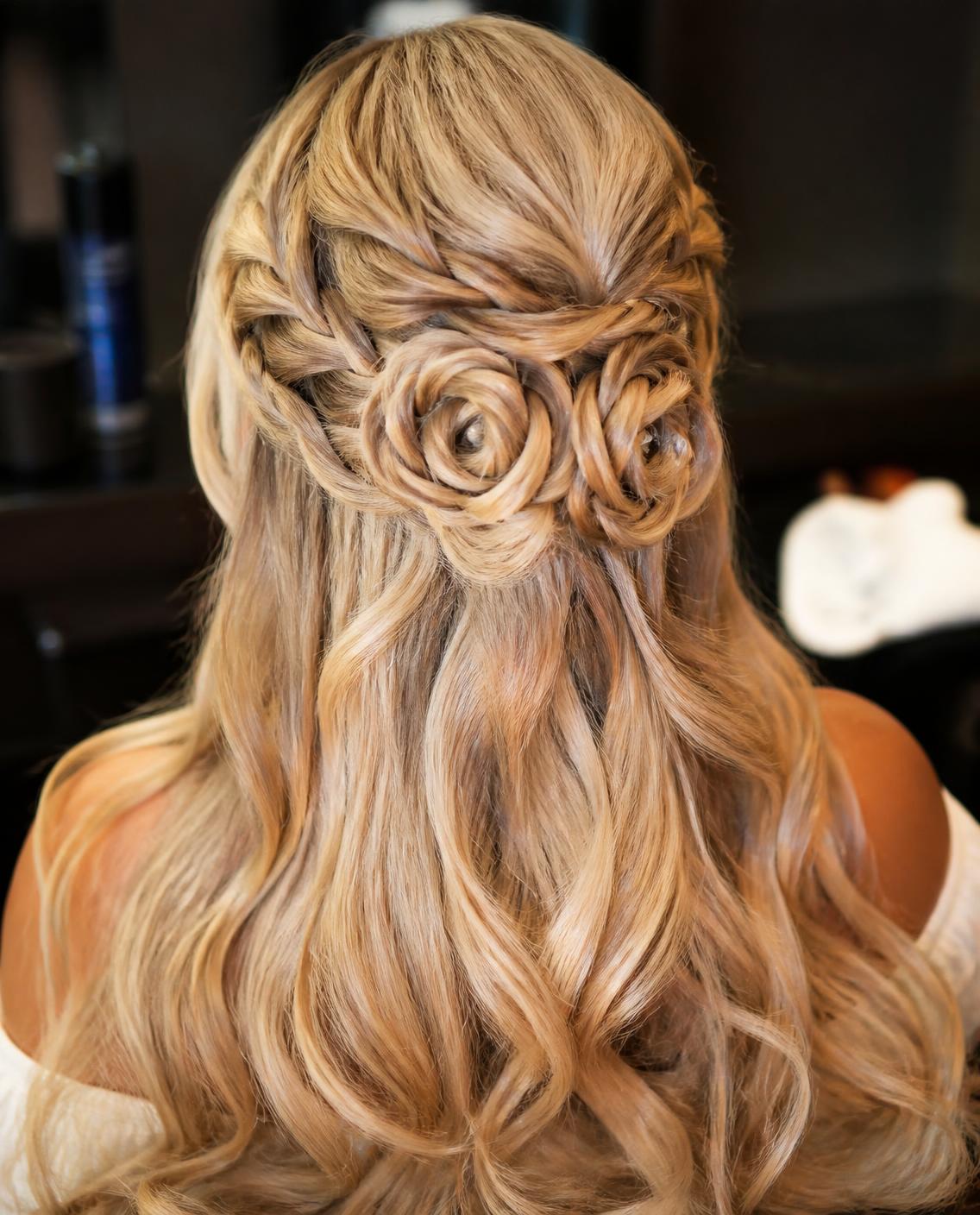 Formal half-up hairstyle with braided rosettes